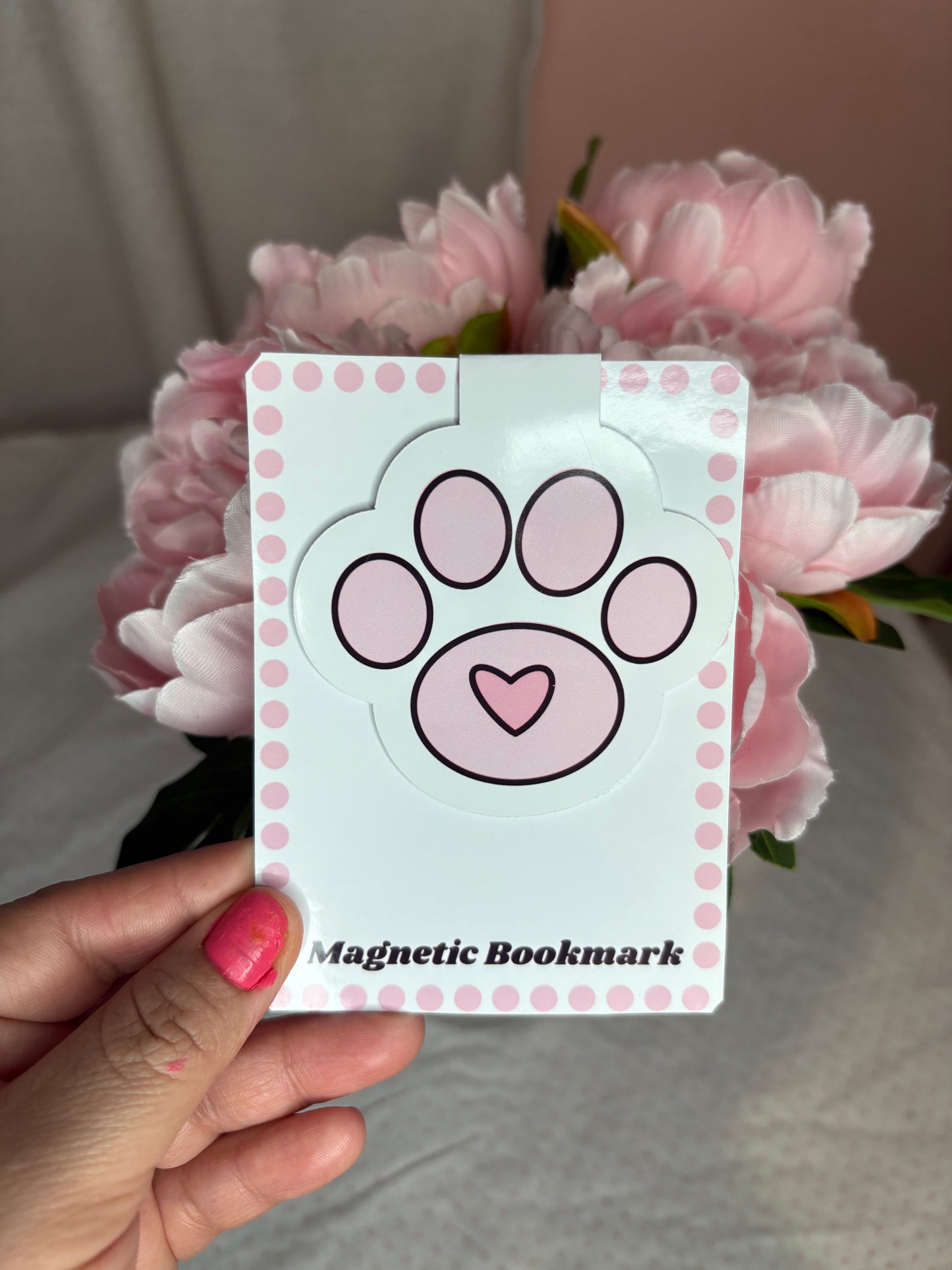 Evelyn’s paw print magnetic bookmark